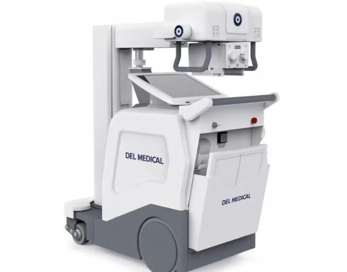 Mobile X-ray machine labeled "DEL MEDICAL" featuring a wheeled base, control panel, and an adjustable X-ray arm.